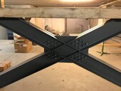 Steel cross for earthquake reinforcement